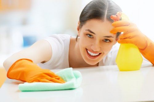 Professional upholstery cleaning in Wimbledon on a fabric sofa