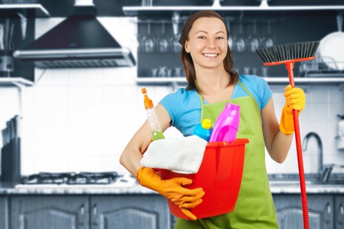 Trained carpet cleaning staff using professional equipment safely